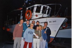 On the last evening: The group in front of the diving boat that had been lifted on land